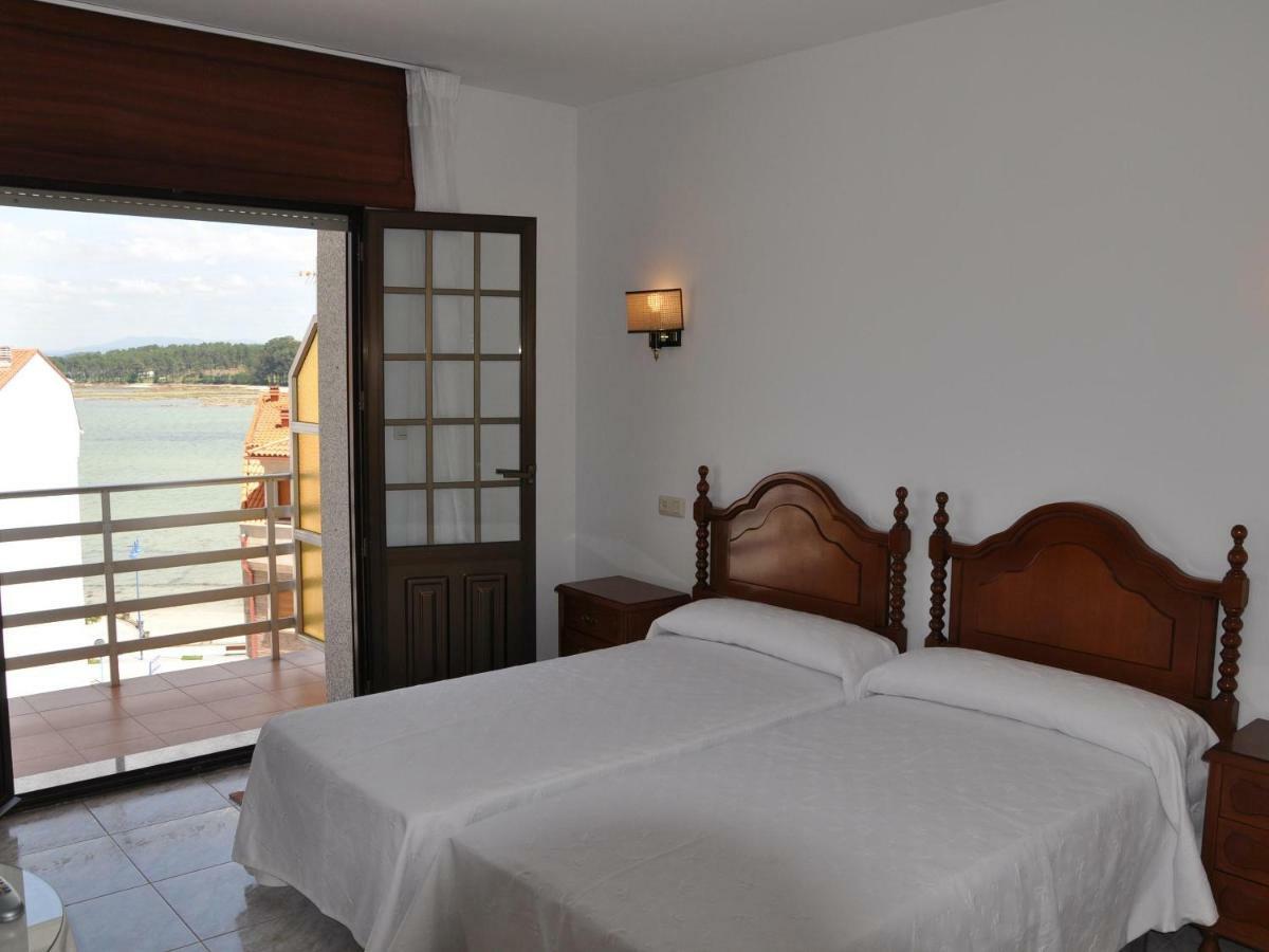 Hostal Mourelos O Grove Quarto foto